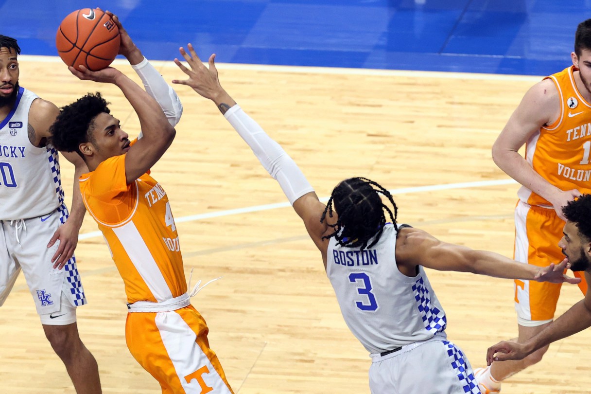 AP photo by James Crisp / Tennessee's Keon Johnson shoots over Kentucky's B.J. Boston during the first half Saturday night in Lexington, Ky.