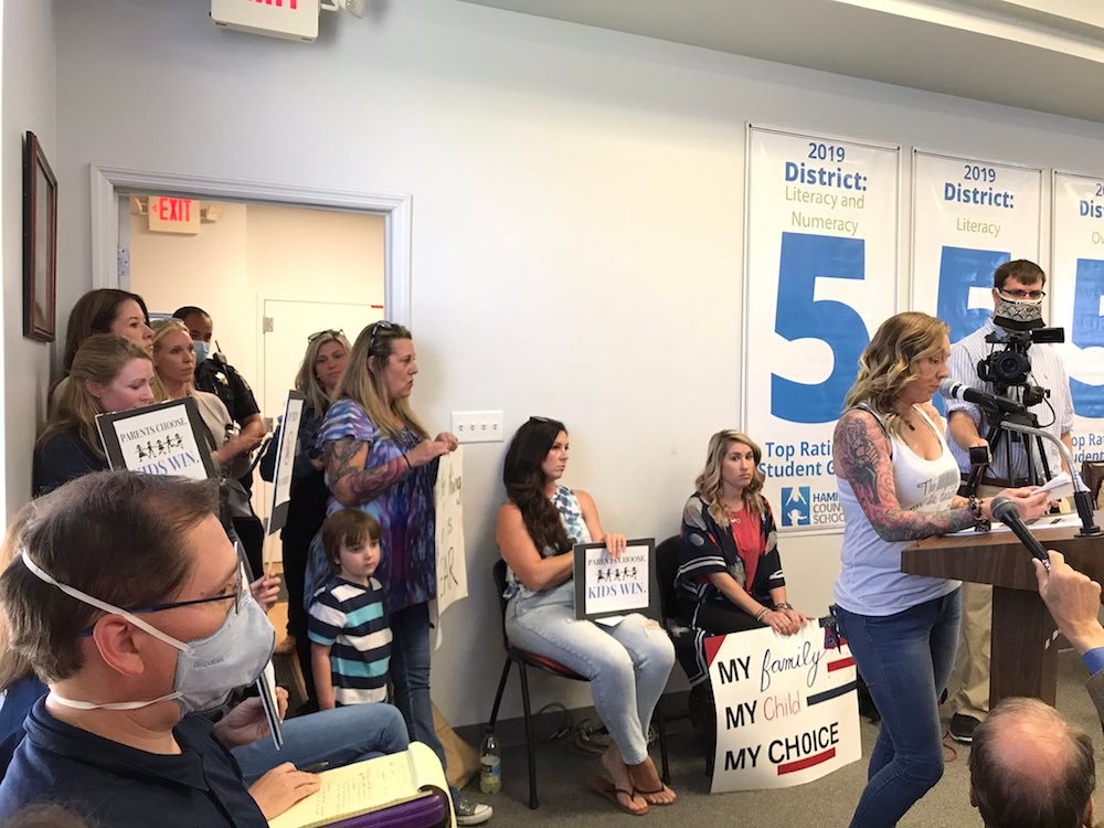 The Hamilton County school board voted 5-3 on Thursday evening, May 13, 2021, to continue requiring masks for students and teachers through the end of the school year. The vote followed a three hour-long meeting attended by parent groups that both supported and disagreed with ending the mask requirement. / Staff photo by Anika Chaturvedi