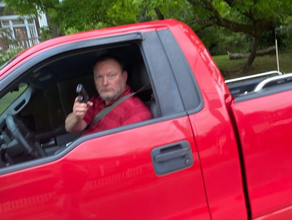 Photo contributed by Adrienne Cooper / This man pointed his gun at Adrienne Cooper after she took photos of his license plate following an alleged road rage incident Tuesday night. Police later arrested Terry Nations.