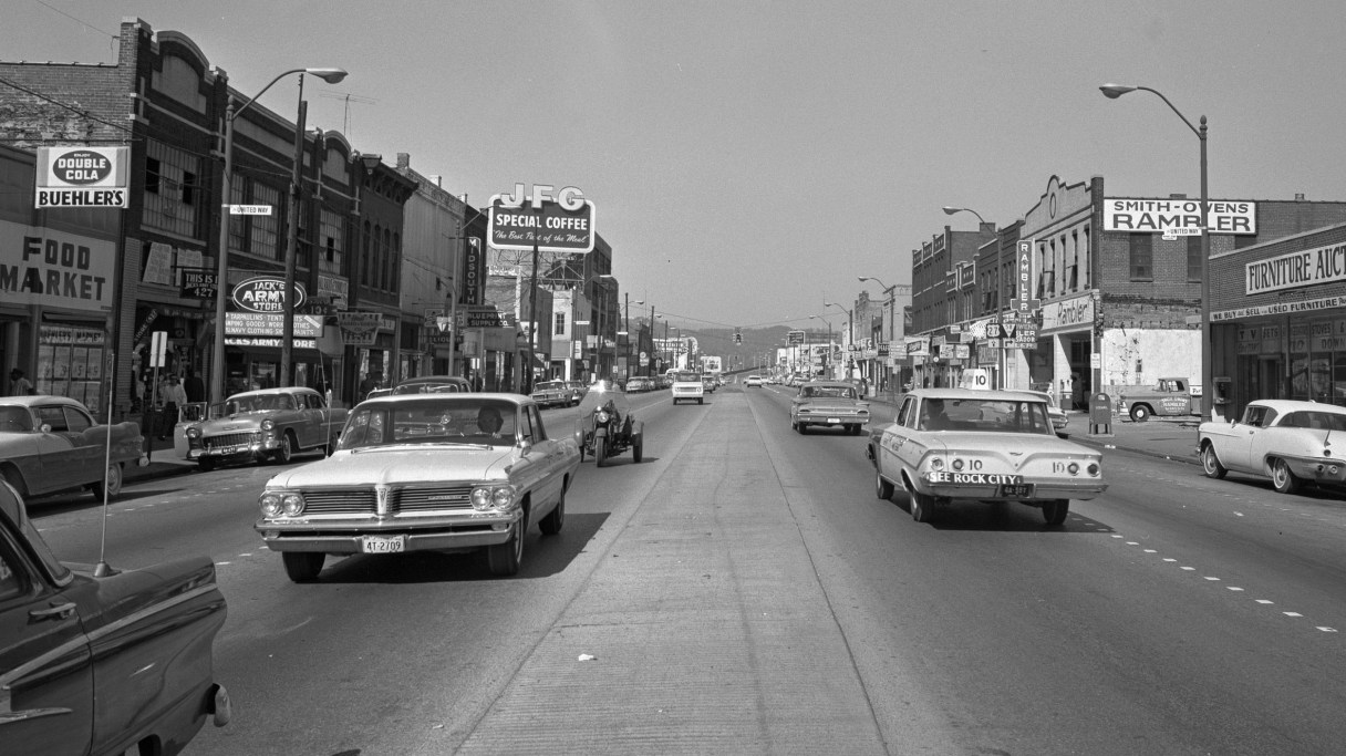This October 1963 photo taken by the staff of EPB shows a stretch of Market Street that holds Newton Chevrolet, Buehler's Food Market, Jack's Army Store and Smith-Owens Rambler in Chattanooga, Tenn.