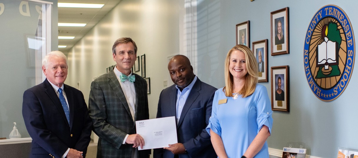 Photo courtesy Bible in the Schools | Hamilton County Schools superintendent Bryan Johnson,second from right, is pictured with Bible in the Schools officials Mike Harrell, Tom Glenn and Cathy Scott.