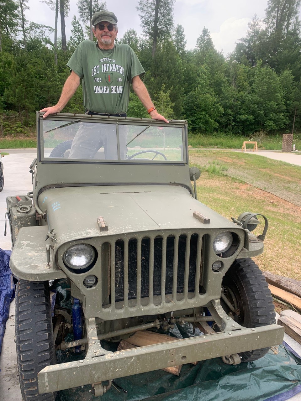 Contributed photo / Joe Barkley is seen with the 1942 Willys Jeep that he and his family returned to running order. Now that the Jeep is repaired, it can be used during the 6th Cavalry Museum's World War II Living History Days to furnish rides to the museum's visitors.