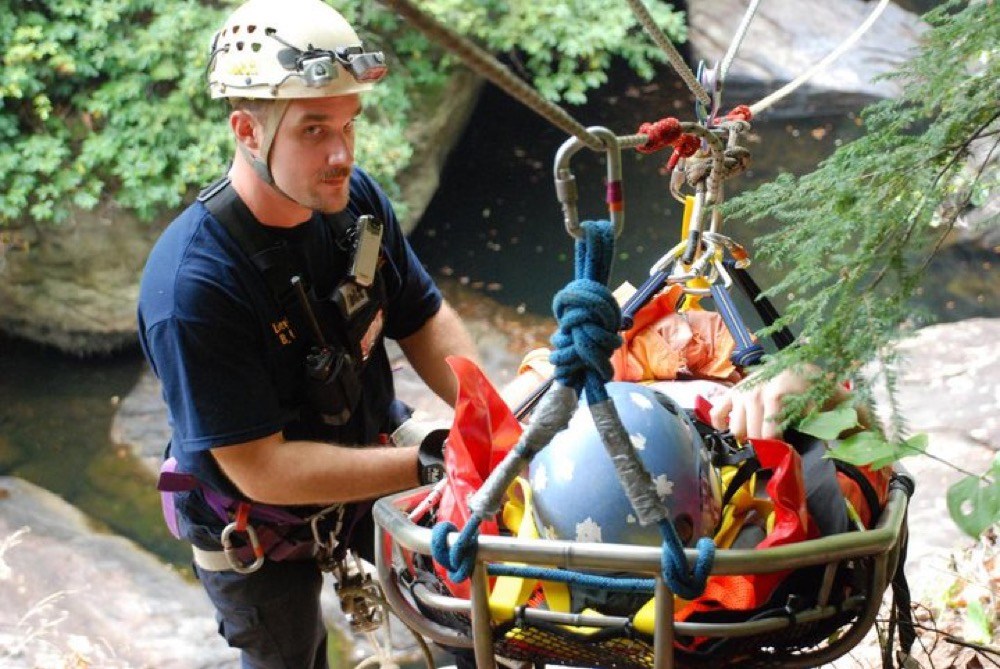 Photo contributed by Chattanooga-Hamilton County Rescue Service / Brad Tipton helps haul a patient to safety along a low-tension guiding line.
