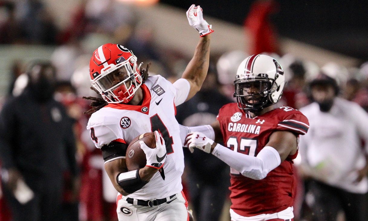 Georgia photo by Travis Bell / Georgia running back James Cook provides a big gain during last season's 45-16 win at South Carolina.