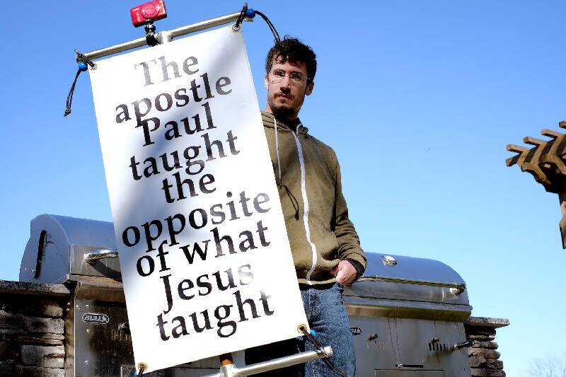Staff Photo / Titus Hartford stands outside his apartment building in Chattanooga on March 28. Hartford's attorney said Friday a civil rights suit his client had filed against the city has been settled.