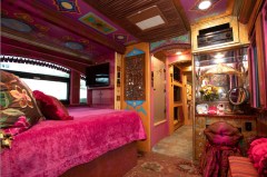 Photo by Curtis Hilbun/ Dollywood / The interior of Dolly Parton’s tour bus, where Dollywood visitors can now pay to sleep.