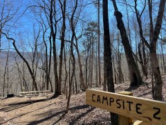 Photo contributed by Eliot Berz/ Campsites are marked with wooden signs along the new extension trail.