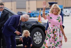 FILE - President Joe Biden looks at his grandson Beau Biden as first lady Jill Biden waves and walks to board Air Force One at Andrews Air Force Base, Md., Aug. 10, 2022. First lady Jill Biden tested positive for COVID-19 and is experiencing 'mild symptoms' the White House announced Tuesday. (AP Photo/Manuel Balce Ceneta, File)