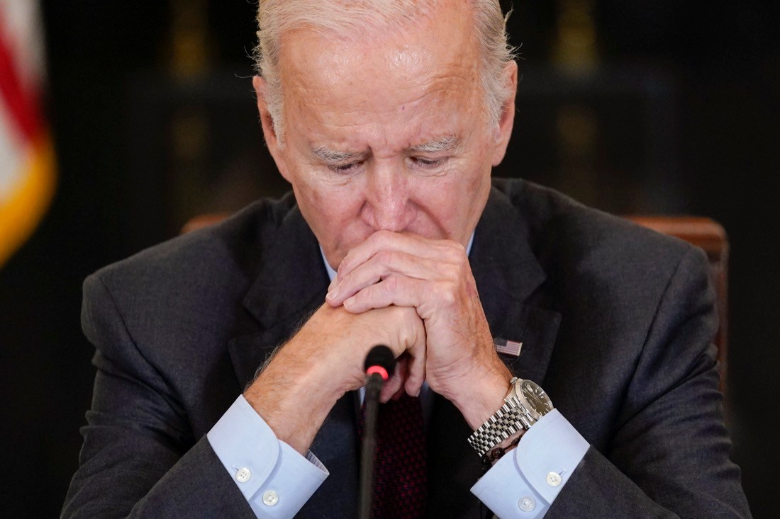 President Joe Biden listens to doctors speak during a meeting of the reproductive rights task force in the State Dining Room of the White House in Washington, Tuesday, Oct. 4, 2022. (AP Photo/Susan Walsh)