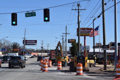 Staff File Photo by Ben Benton / Starting Monday, South Moore Road Extension leading to the Food Lion grocery store, a bank and nearby homes will be closed for an expected three days. Seen on Jan. 5, Talley Construction crews work at the intersection to be closed next week.
