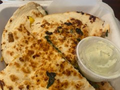 Photo by Barry Courter / The quesadilla at Coqui Puerto Rican restaurant on Ringgold Road has proven a hit with patrons since the eatery opened in early January.