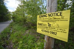 Staff Photo by Matt Hamilton / A zoning notice sign in front of 2001 Hollister Road is seen on Signal Mountain on May 1.