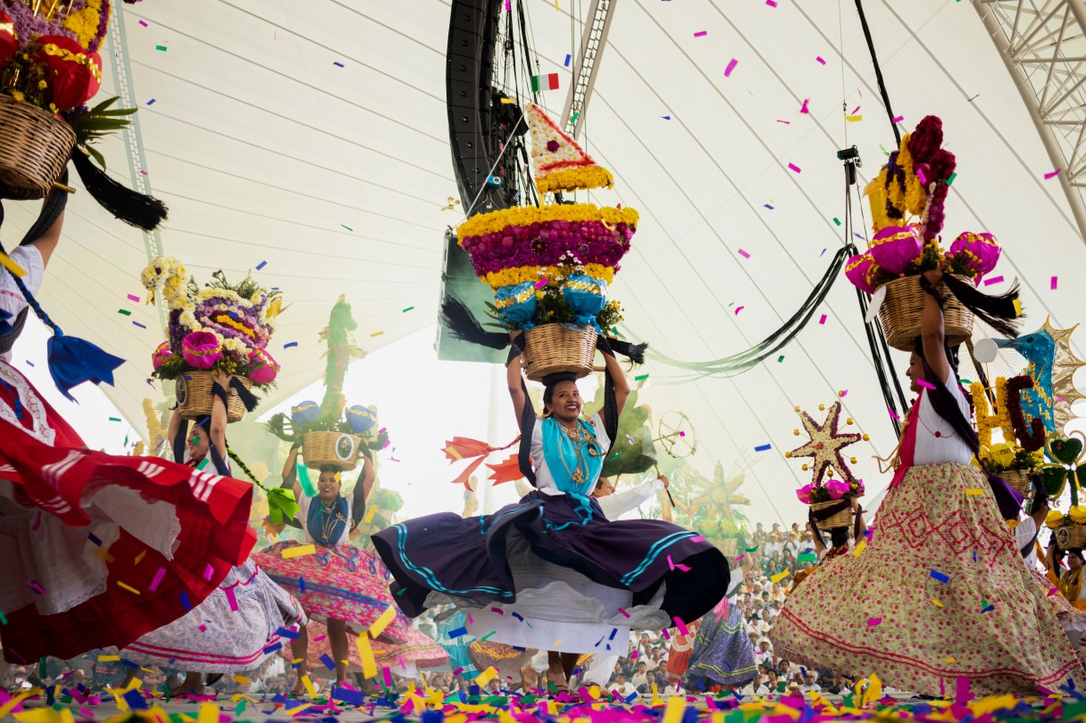 Dancers perform on the first day of the Guelaguetza in Oaxaca, Mexico, Monday, July 17, 2023. During the government-sponsored event, 16 Indigenous ethnic groups and the Afro-Mexican community promote their traditions through public dances, parades and craft sales. (AP Photo/Maria Alferez)