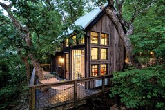 Photo contributed by Treetop Hideaways / Wood Lily, one of Treetop Hideaways' three new treehouses, features a large wraparound deck with cutouts for trees to grow through.