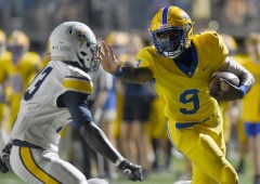 Staff photo by Matt Hamilton / Boyd Buchanan's Jaylon Sanderfer carries the ball for his second of three touchdowns during Friday night's home win against Chattanooga Christian in a Division II-AA East Region game.