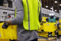 Amazon unveiled a new bipedal robot — named Digit — Wednesday. Digit, which is still in the testing phase, will help workers move empty totes. (Amazon/TNS)