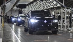 Staff photo by Matt Hamilton / Volkswagen ID.4 all-electric SUVs roll off the assembly line during the vehicle's launch at the Chattanooga production plant in 2022. The Chattanooga-made EV is now eligible for a federal tax credit.