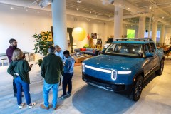 Rivian employees meet in the company's new showroom at Ponce City Market in Atlanta on Oct. 19, 2023. (Arvin Temkar/The Atlanta Journal-Constitution/TNS)
