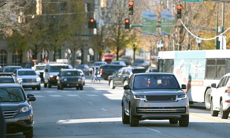 Staff photo by Matt Hamilton / Vehicles drive Dec. 5 along Frazier Avenue. Officials with the city of Chattanooga are preparing recommendations for the roadway in an attempt to help vehicles and pedestrians coexist safely.