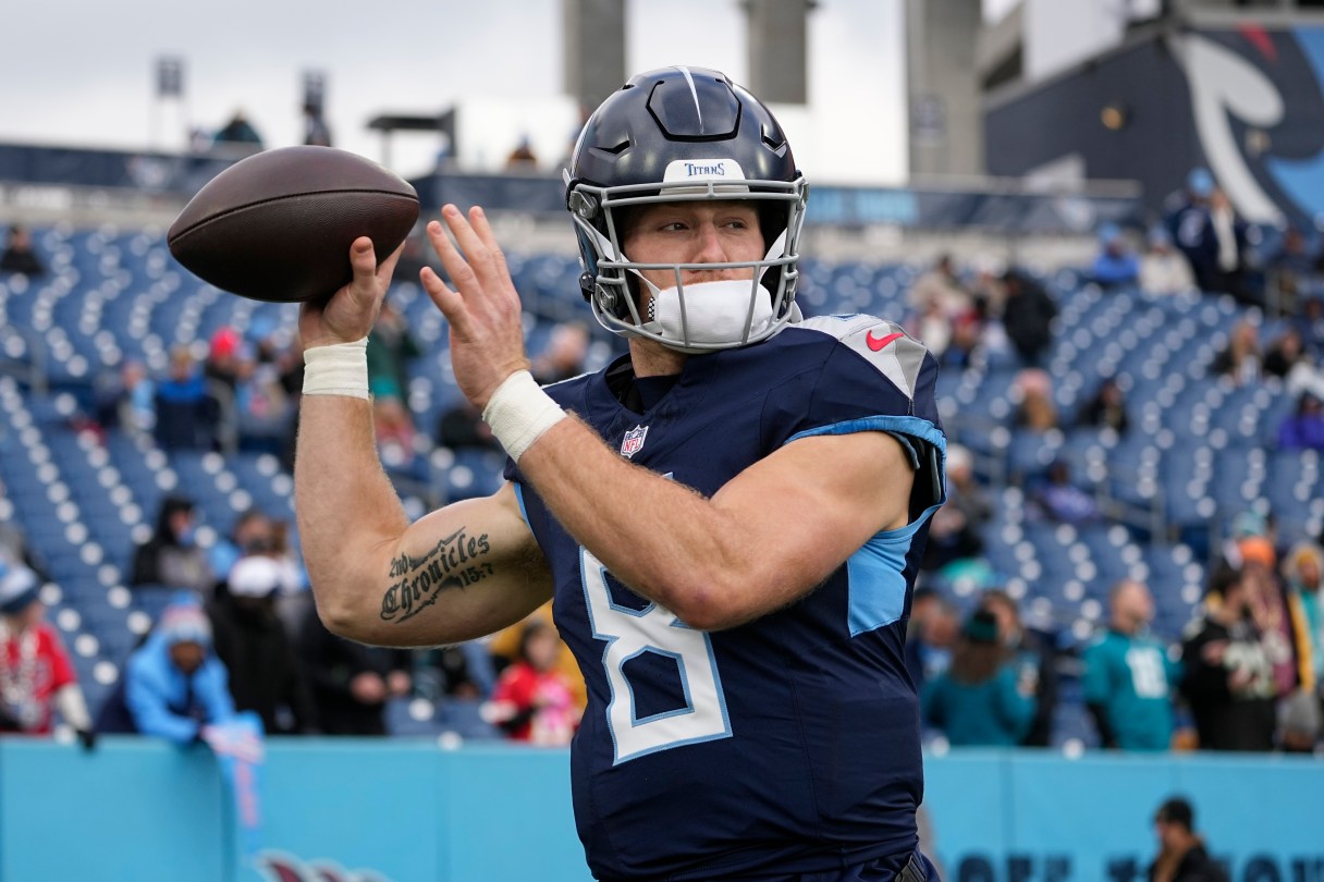 FILE - Tennessee Titans quarterback Will Levis warms up before an NFL football game against the Jacksonville Jaguars, Jan. 7, 2024, in Nashville, Tenn. The Titans have been among the league's biggest spenders in free agency, and they still won't be able to fill all the remaining holes with only seven selections in this NFL draft. (AP Photo/George Walker IV, File)