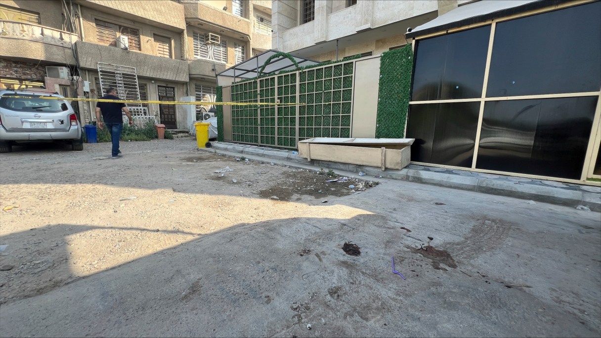 Blood covers the ground at the scene of a shooting on Saturday, April 27, 2024 in Baghdad, Iraq. Iraqi authorities are investigating the killing of Ghufran Mahdi Sawadi, a well-known social media influencer, who was shot by an armed motorcyclist in front of her home in central Baghdad. (AP Photo/Ali Jabar)