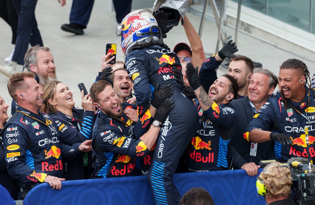 The Canadian Press photo by Paul Chiasson via AP / Red Bull Racing driver Max Verstappen, center, celebrates with his team after winning Formula 1's Canadian Grand Prix on Sunday in Montreal.