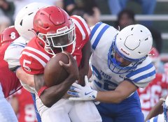 Staff photo by Matt Hamilton/ Dalton senior receiver Kendrix London, left, tries to break free from Trion's Curt Hambright during a scrimmage in May. London is the only returning offensive skill player returning for the Catamounts.