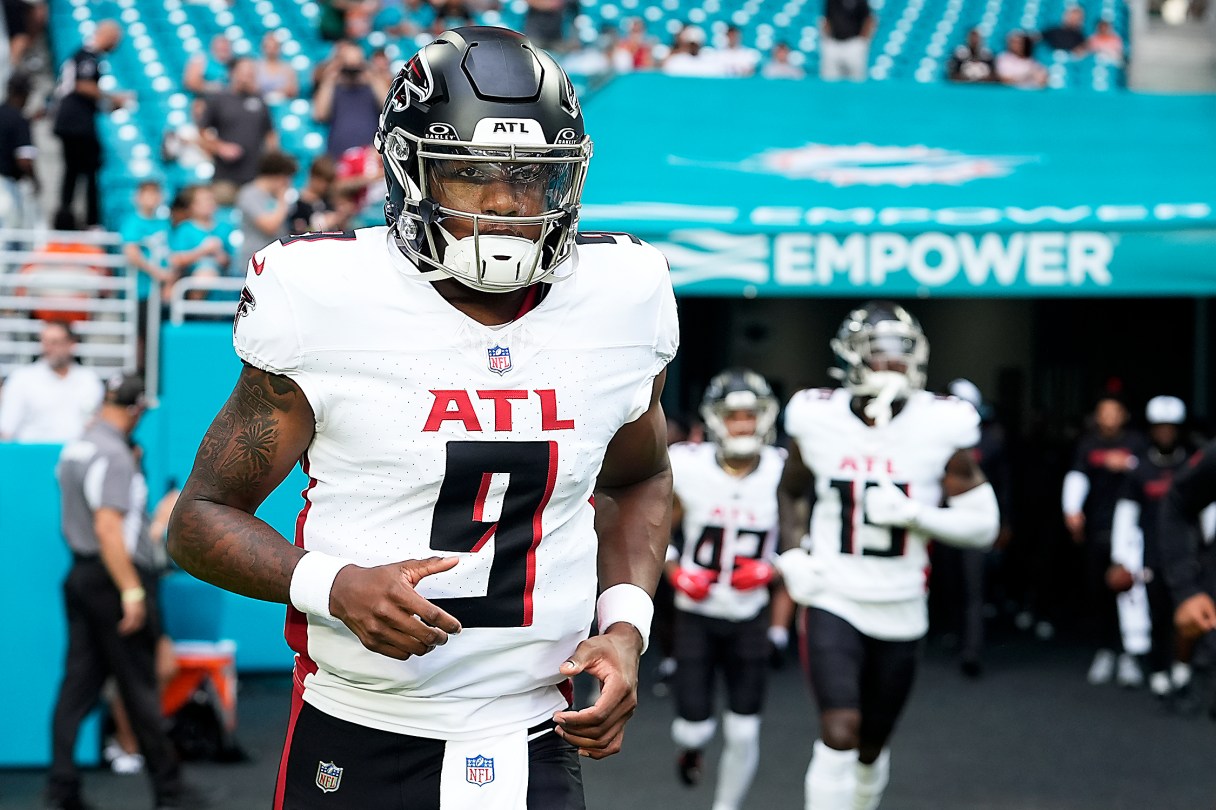 Falcons quarterback Michael Penix Jr. runs onto the field before a preseason game earlier this month against the Dolphins in Miami Gardens, Fla. (Associated Press)