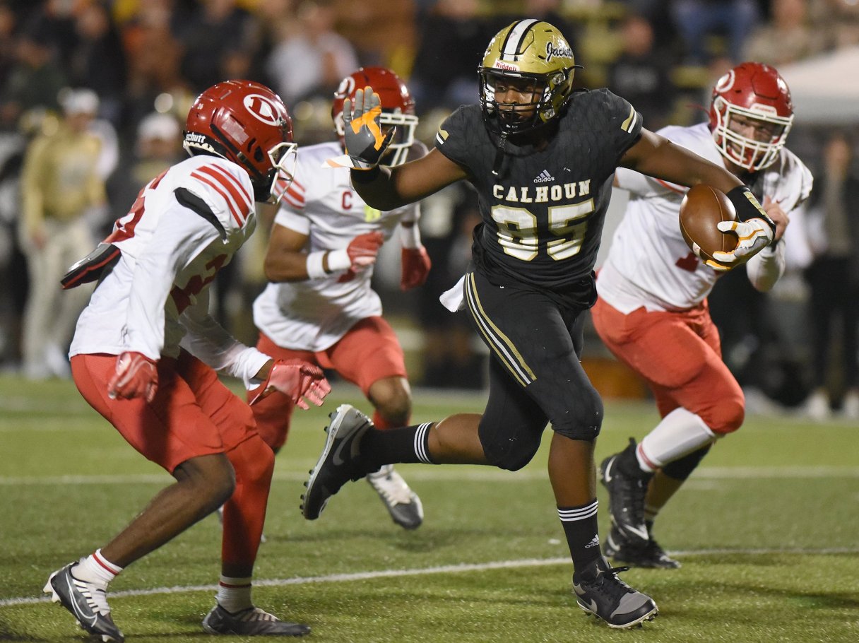 Staff file photo by Matt Hamilton / Calhoun and senior Emaree Winston (85) rolled into the GHSA Class AAA quarterfinals with a 38-14 home win over Atlanta's Douglass on Friday night.
