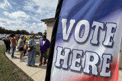 Photo by Kathleen Greeson / Antonio Herrera, dressed in a Joker costume, and Mary Beth Browne Hopping, in a banana costume, brought students from Baylor to vote at the Hamilton County Election Commission on Thursday, Oct. 31, 2024.