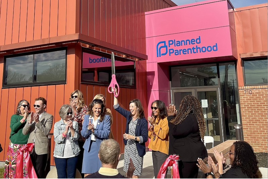 Community leaders and officials with Planned Parenthood celebrate the official reopening of the organization's Knoxville Health Center, nearly three years after arson destroyed the original facility. (Tennessee Lookout Photo by Angela Dennis)