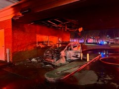 Chattanooga Fire Department / A car fire at an EPB building drive-through early Sunday sent the vehicle's occupant to the hospital with burns.