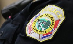Staff photo / A Collegedale Police Department patch is seen on the shoulder of an officer in 2019 in Collegedale. Three officers involved in a drunken incident at Neyland Stadium while off-duty will not face criminal charges due to a lack of evidence.