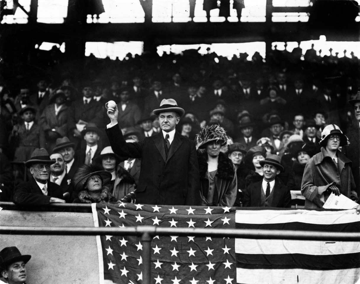 Photo/The New York Times Photo Archives / President Calvin Coolidge opens the baseball season in Washington by tossing out the first ball in a game between the Senators and the Athletics on April 20, 1924.