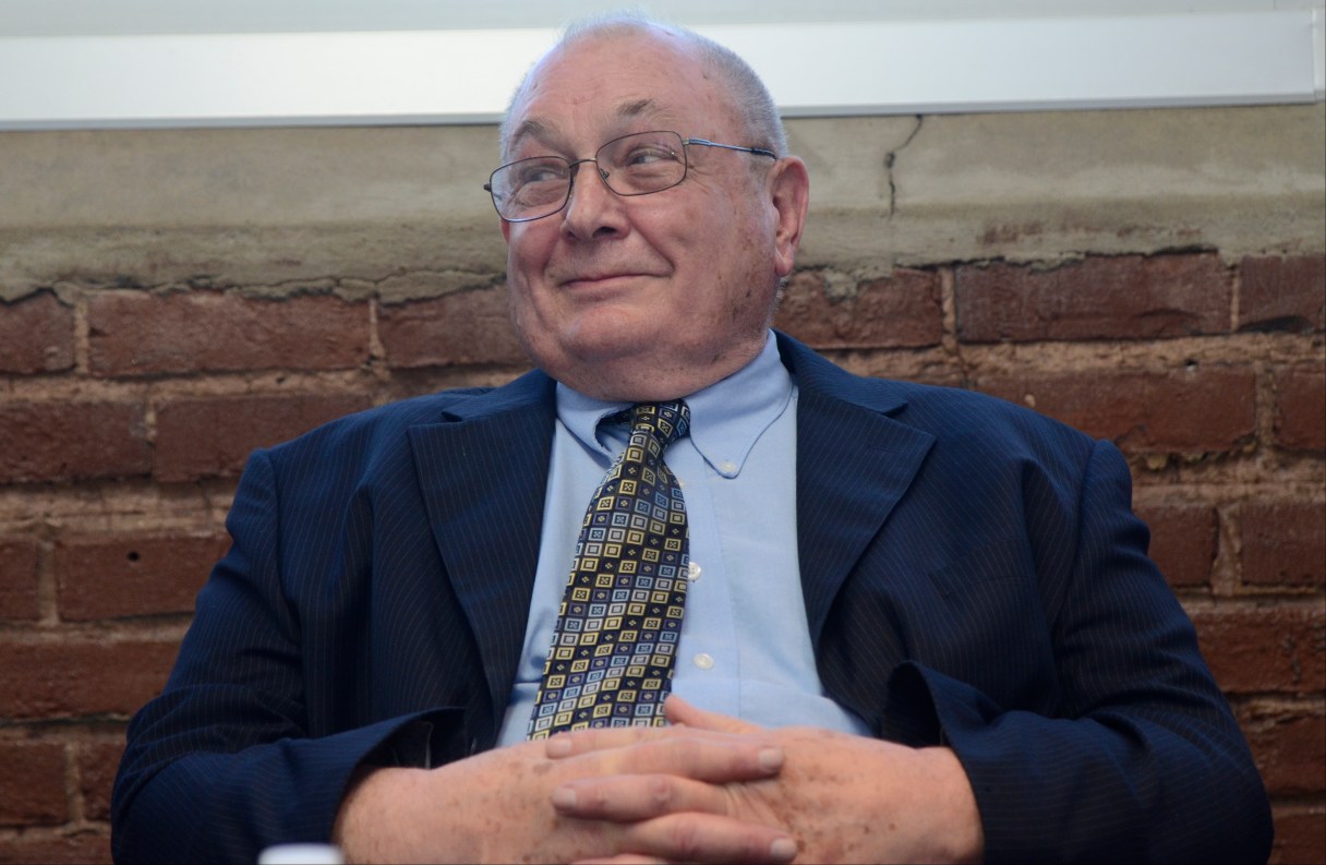Staff File Photo / Then-Hamilton County Commissioner Fred Skillern talks to reporters at the Chattanooga Times Free Press in 2014.