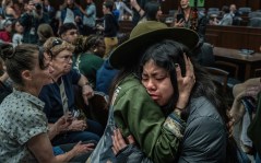 Sylvia, who came to the Tennessee legislature from Knoxville on Tuesday, cries as lawmakers on the house K-12 subcommittee vote in favor of a bill to exclude children without legal immigration status from public schools. She asked that her name not be used out of fear of reprisal. (Photo: John Partipilo / Tennessee Lookout)
