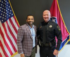 Hamilton County Sheriff's Office / Hamilton County Sheriff Austin Garrett poses for a photo with FBI Director Kash Patel in Nashville on March 21, 2025.