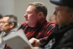 Staff photo by Matt Hamilton / Hamilton County Commissioner Jeff Eversole listens as Kim Helton speaks during a community meeting at the Harrison Community Center on Jan. 2, 2025.