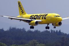 FILE - A Spirit Airlines 319 Airbus approaches Manchester Boston Regional Airport for a landing, Friday, June 2, 2023, in Manchester, N.H. (AP Photo/Charles Krupa, File)