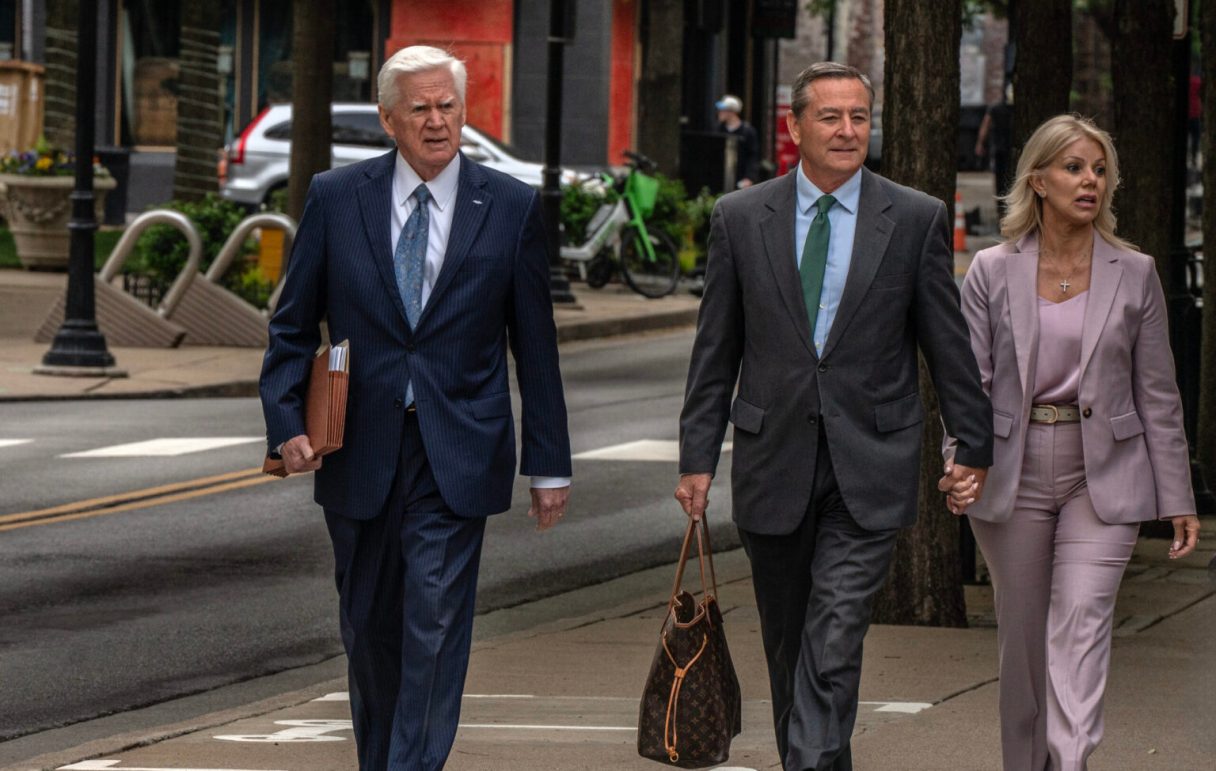 Former Tennessee Speaker of the House Glen Casada, center, walks to the Fred D. Thompson Federal Courthouse on April 22, 2025, for the start of his trial on corruption charges, accompanied by his wife and attorney Ed Yarbrough. (John Partipilo/Tennessee Lookout)