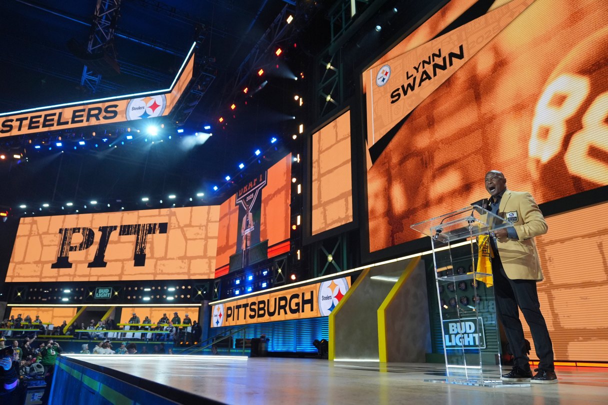 AP photo by Jeff Roberson / Former player Lynn Swann announces a pick by the Pittsburgh Steelers during the third round of the NFL draft Friday night in Green Bay, Wis.