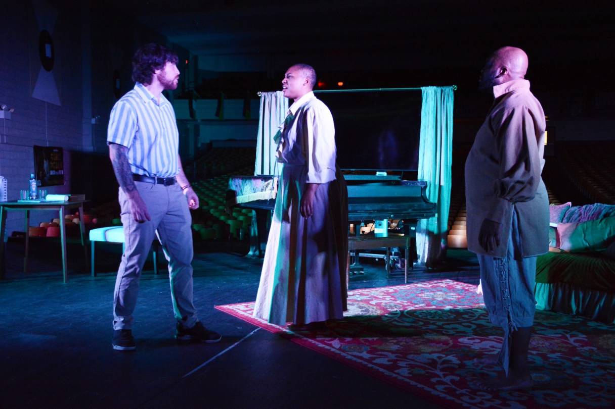 Staff Photo by Robin Rudd / Lin-Manual Miranda, played by Amir Andalib, left, is haunted by the spirits of slaves, played by Marvin Parks and Ashley Noel. A production of "The Haunting of Lin-Manuel Miranda" will be performed at The Howard School from May 2 to May 4, 2025.