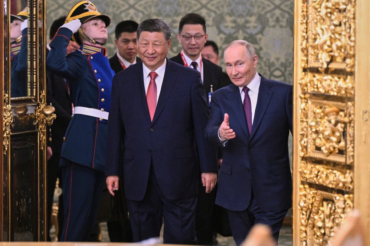 Russian President Vladimir Putin, right, and his Chinese counterpart Xi Jinping arrive for their talks at the Kremlin in Moscow, Russia, Thursday, May 8, 2025, ahead of celebrations of the 80th anniversary of the Soviet Union's victory over Nazi Germany during the World War II. (Alexei Danichev/Photo host agency RIA Novosti via AP)