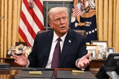 President Donald Trump speaks to journalists about TikTok as he signs executive orders in the Oval Office of the White House in Washington, D.C., on Jan. 20, 2025. (Jim Watson/Pool/AFP/Getty Images/TNS)
