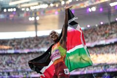 AP photo by Ashley Landis / Kenyan runner Faith Kipyegon celebrates after winning the gold medal in the women's 1500-meter run at the Paris Olympics in Saint-Denis on Aug. 10, 2024.