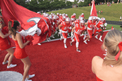 Staff photo by Matt Hamilton/ Baylor players storm onto the field before the start of their game against Lipscomb Academy at Baylor School on Friday, September 8, 2023.