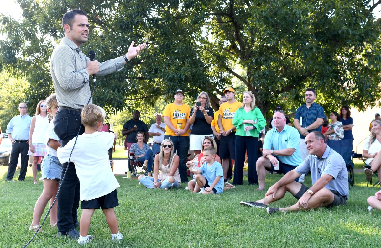 Staff Photo by Robin Rudd / Hamilton County Mayor Weston Wamp plans to announce his reelection run at a family picnic at Chest Frost Park. Wamp, left, is seen here with family members and supporters at Lookout Valley's John A. Patten Park on Aug. 2, 2022.