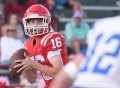 Staff file photo by Matt Hamilton / Dalton sophomore Caine Woods is being counted on as the starting quarterback in the program's new offense as Chris Prewett takes over as head coach.
