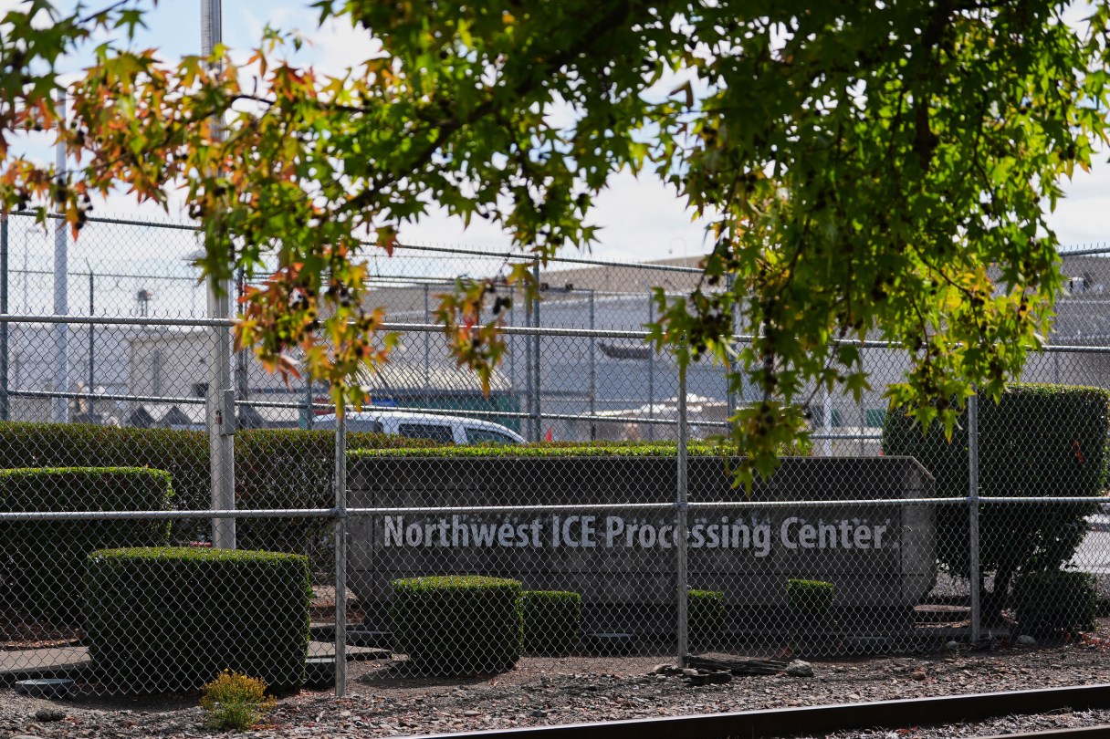 The entrance to the Northwest U.S. Immigration and Customs Enforcement Processing Center is seen, Aug. 13, 2025, in Tacoma, Wash. (AP Photo/Lindsey Wasson)