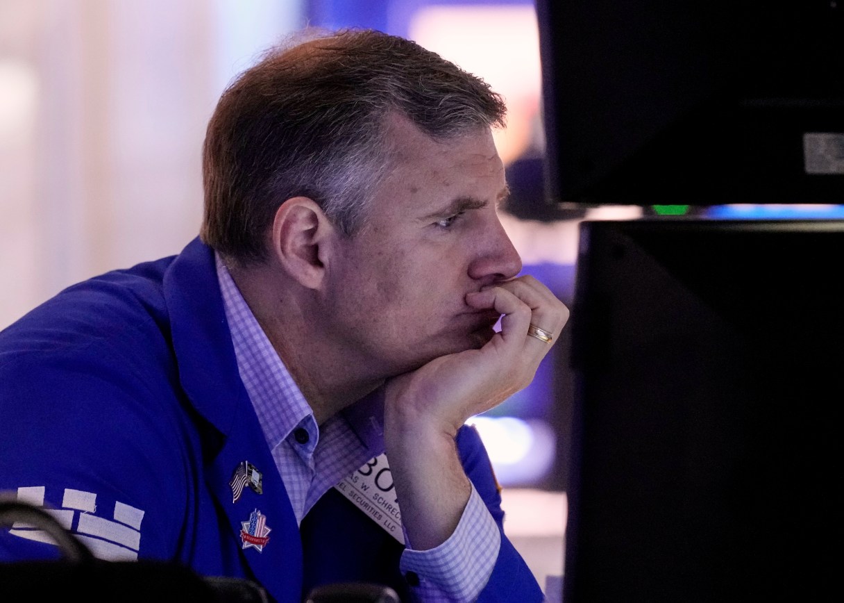 Specialist Thomas Schreck works at his post on the floor of the New York Stock Exchange, Friday, Sept. 5, 2025. (AP Photo/Richard Drew)